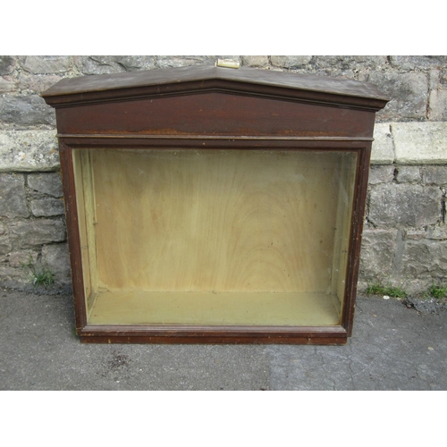 2367 - A Victorian pine wall mounted shop display cabinet with glazed panelled front, set beneath an archit... 