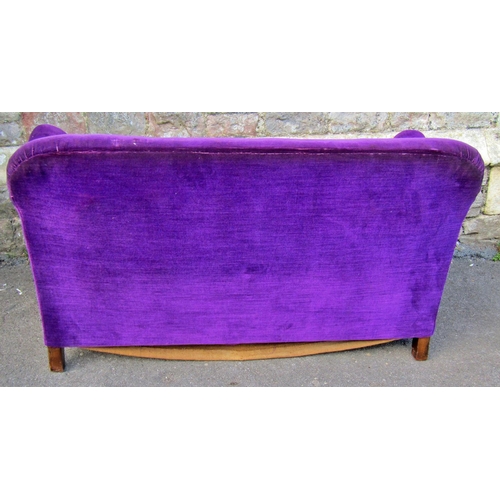 2369 - An Edwardian cottage sofa to seat two, raised on a carved and moulded lower frame, with later uphols... 