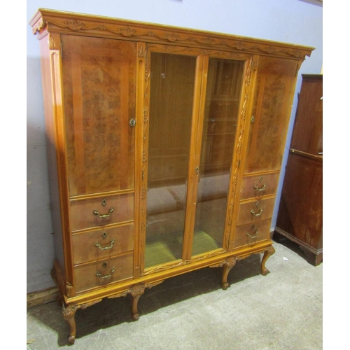 2441 - A walnut and burr walnut dining room suite, the D end table raised on cabriole supports, together wi... 