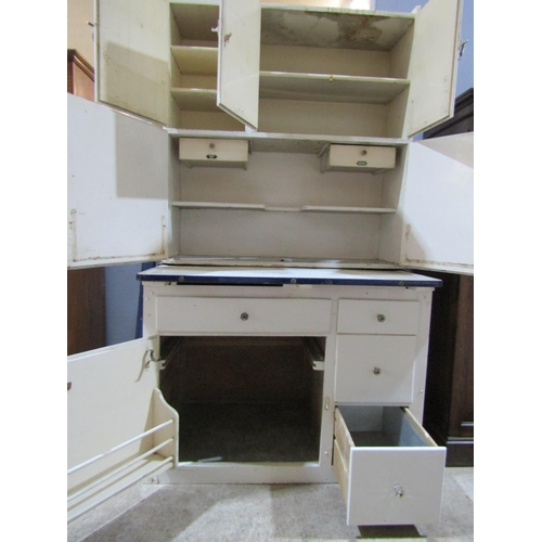 2471 - A vintage freestanding kitchen cabinet the lower section with drawers and cupboards, enamel work sur... 