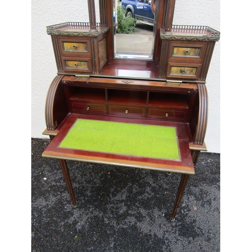 2473 - A late 19th century French ladies cylinder top bureau enclosing a fitted interior, raised back with ... 