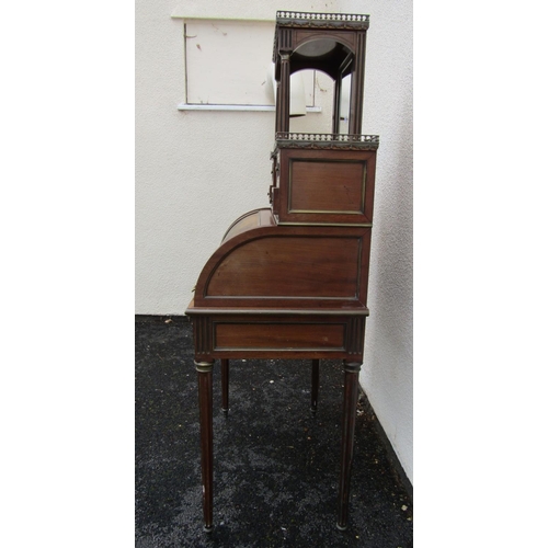 2473 - A late 19th century French ladies cylinder top bureau enclosing a fitted interior, raised back with ... 