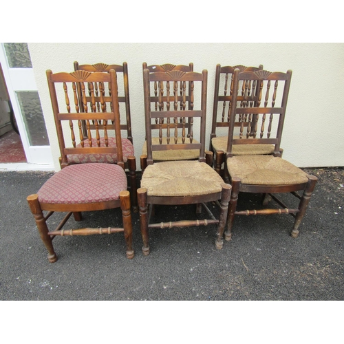 2507 - A set of six spindle back dining chairs (four with rush seats) together with a further set of six 19... 