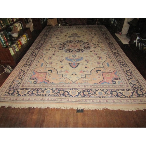 2733 - A large eastern wool carpet with pale cream ground, with central medallion, abstract floral detail s... 