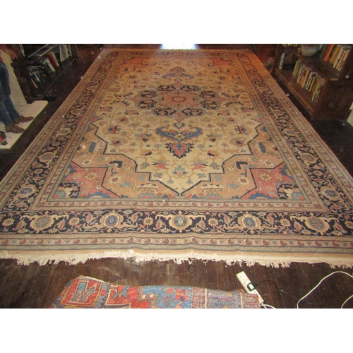 2733 - A large eastern wool carpet with pale cream ground, with central medallion, abstract floral detail s... 