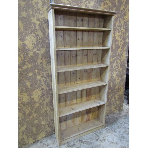 2435 - A rustic stripped pine floorstanding open bookcase with fixed shelves, 84 cm x 20 cm deep x 176 cm h... 