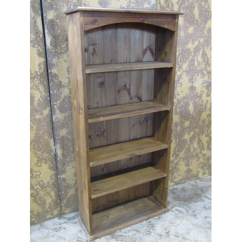 2435 - A rustic stripped pine floorstanding open bookcase with fixed shelves, 84 cm x 20 cm deep x 176 cm h... 