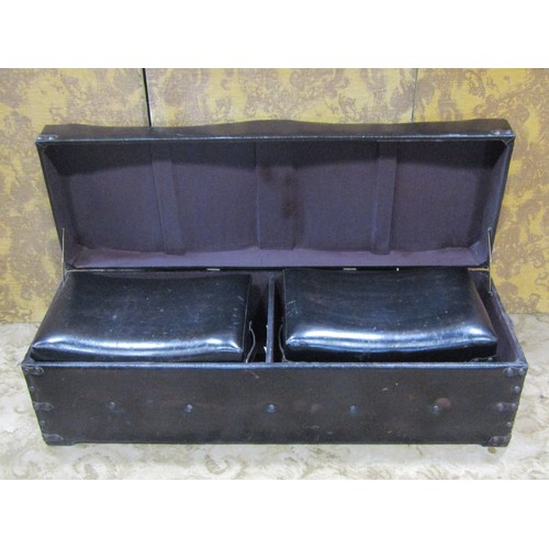 2436 - A contemporary synthetic leather upholstered two divisional box stool/ottoman containing a pair of s... 