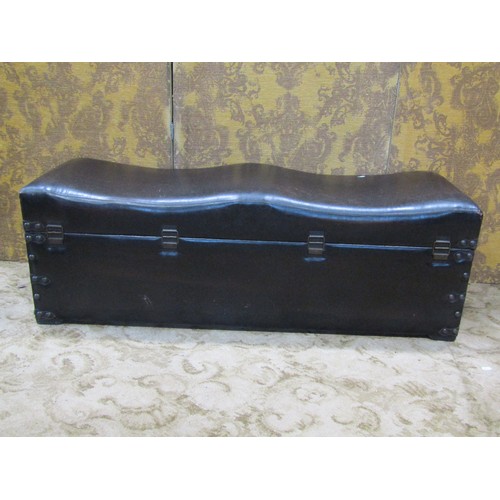 2436 - A contemporary synthetic leather upholstered two divisional box stool/ottoman containing a pair of s... 