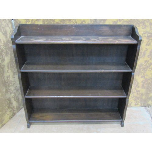 2308 - A simple open oak bookcase with three adjustable shelves 90 cm wide, together with one other (2)