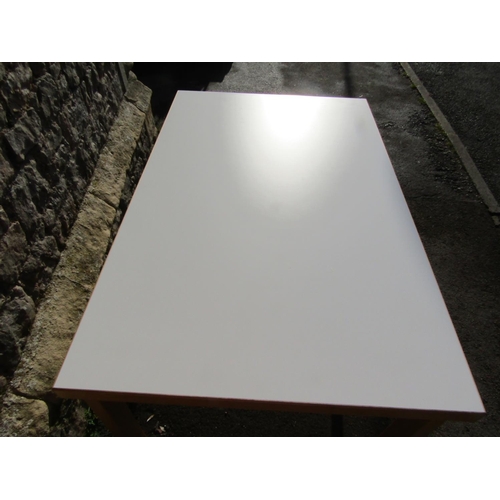 2393 - An Artek 82B Alto six seat birchwood dining table with white HPL top, 135cm x 85cm x 72cm