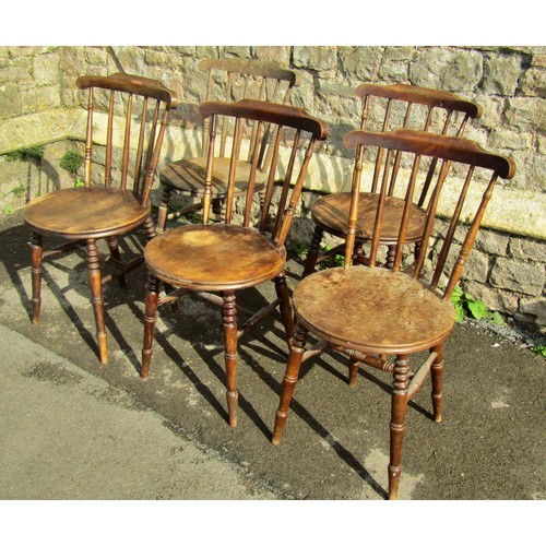 2134 - A set of five stained beech Swedish stickback kitchen chairs with circular seats