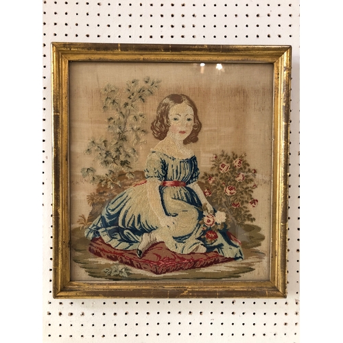 72 - 19th century tapestry of a girl in a blue dress sitting on a cushion holding roses, in a gilt frame ... 