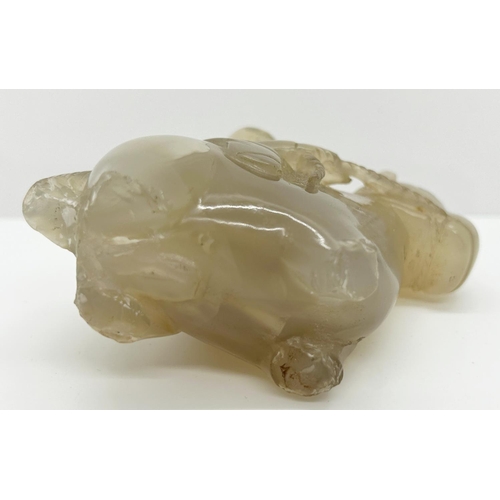 1078 - A Chinese pale carved jade figure, horse and rider (A/F) (partial) 7cm high, 17cm long (displayed in... 