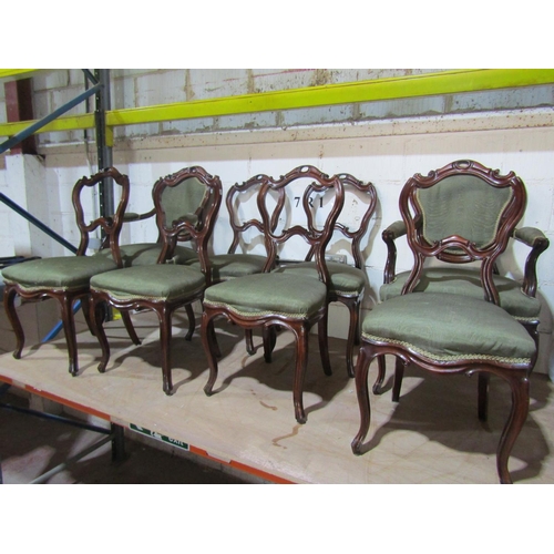 2449 - A set of eight Victorian walnut dining chairs (6+2) with carved, moulded and pierced show wood frame... 