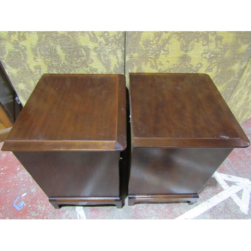 2458 - A pair of Stag bedside chests each fitted with four drawers on brackets supports, together with a St... 