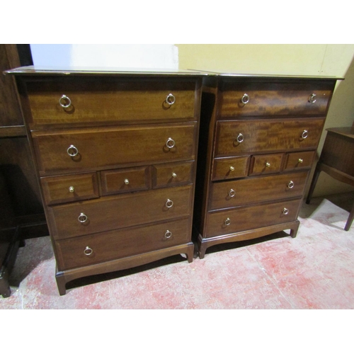 2459 - a pair of Stag chest of drawers fitted with a multi arrangement of drawers