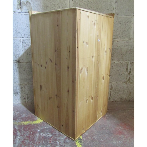 2463 - A contemporary pine corner cupboard enclosed by a door, 91cm high