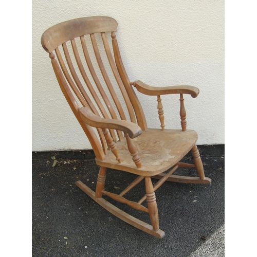 2484 - A Windsor lathe back rocking chair together with four Victorian lathe back kitchen chairs, all with ... 