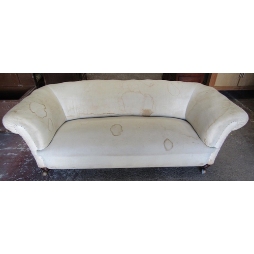 2487 - A Victorian Chesterfield frame on turned supports, 2 metres wide approx