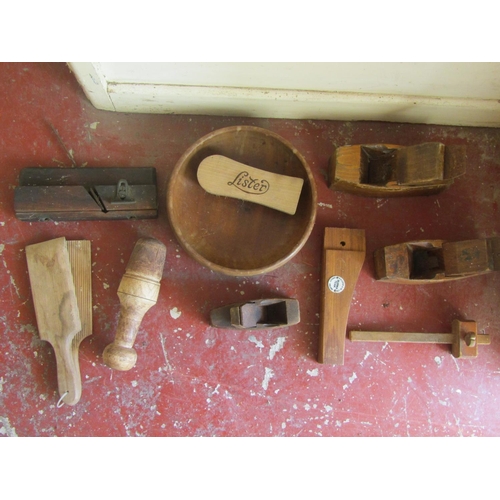 2491 - A galvanised bucket containing a mixed collection of old woodworking planes, dairy pats, etc