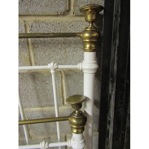 2516 - A Victorian brass and iron double bedstead frame with rails to accept a 4ft 6 mattress