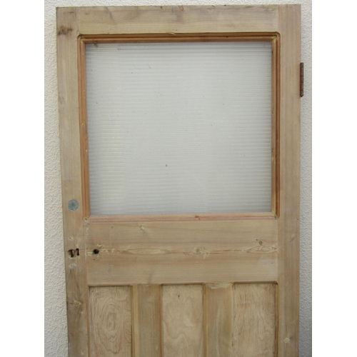 2517 - Five various stripped pine and panelled doors, two partially glazed