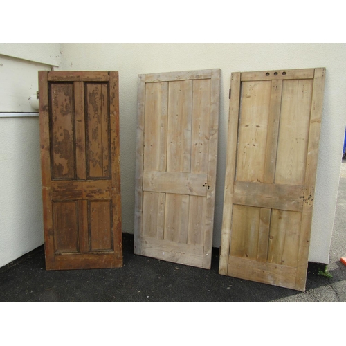 2517 - Five various stripped pine and panelled doors, two partially glazed