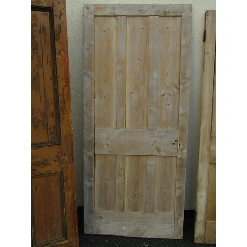 2517 - Five various stripped pine and panelled doors, two partially glazed