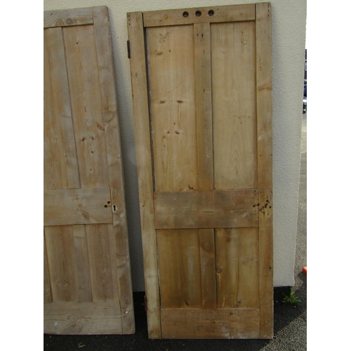 2517 - Five various stripped pine and panelled doors, two partially glazed