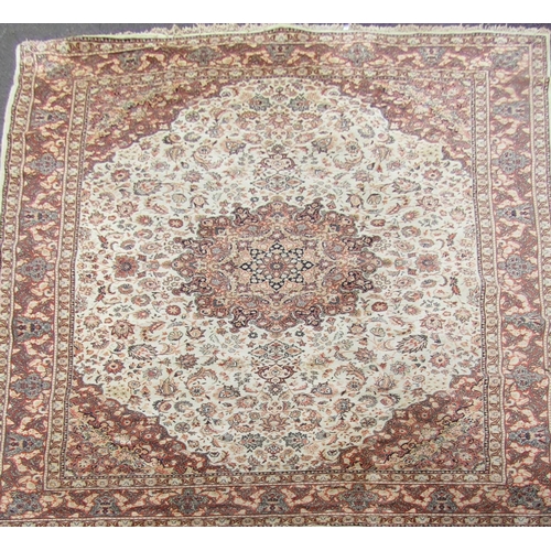 2737 - A Turkish Wilton type machine made rug with traditional Perisan design in tones of cream and orange,... 