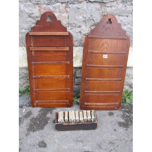 2079 - A pair of oak chapel hymn boards, with simple pierced trefoil detail, together with a simple stained... 