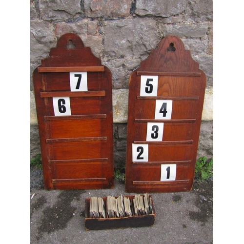 2079 - A pair of oak chapel hymn boards, with simple pierced trefoil detail, together with a simple stained... 