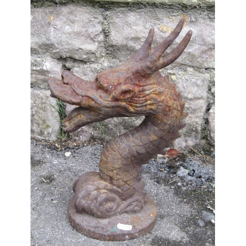 2080 - Aa vintage weathered cast iron scrolling dragons head finial, 36cm high