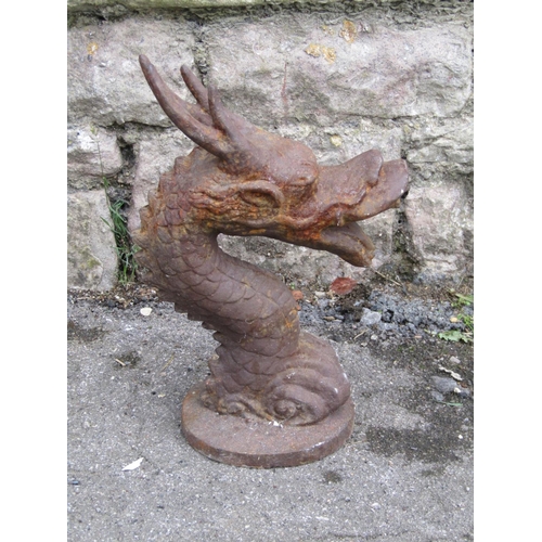 2080 - Aa vintage weathered cast iron scrolling dragons head finial, 36cm high