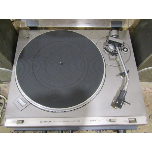 2128 - A Hitachi direct drive turntable model HT-356 together with a pair of Hitachi speakers model HS-M2 a... 