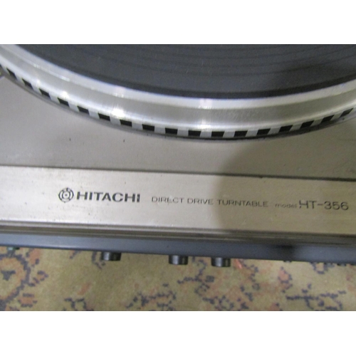 2128 - A Hitachi direct drive turntable model HT-356 together with a pair of Hitachi speakers model HS-M2 a... 