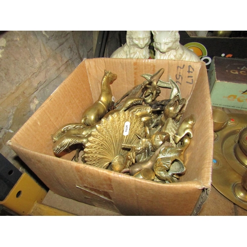 2132 - A quantity of miscellaneous brassware mainly small ornaments,  a boxed Acos hi-fidelity microphone, ... 