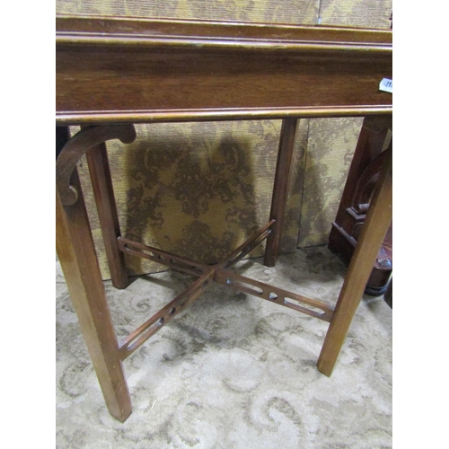 2183 - A small mahogany console/pier table with loose rectangular marble top over a frieze drawer and scrol... 