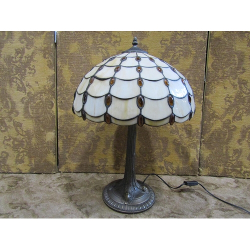 2254 - Simulated bronze table lamp with leaded light shade, 67 cm high