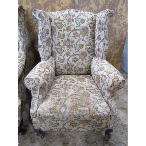 2310 - A near pair of Georgian style wing chairs with Tudor style tapestry upholstery