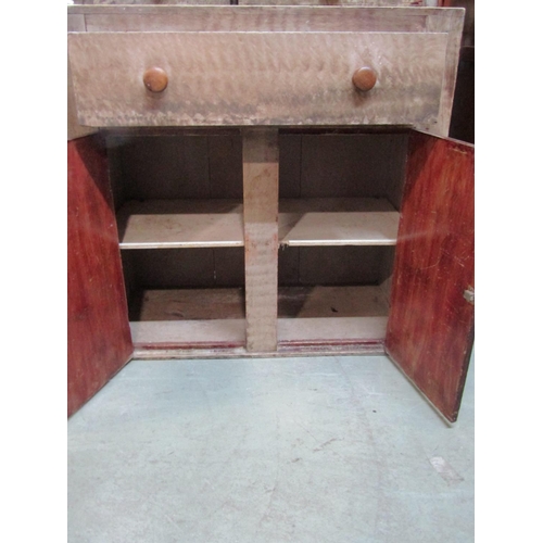 2356 - A 19th century pine cupboard, the lower section enclosed by two doors and a single frieze drawer, th... 