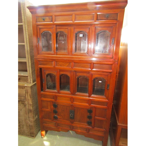 2357 - A Korean cabinet of full height in mixed woods including pine and elm, the front elevation enclosed ... 