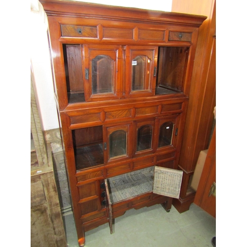 2357 - A Korean cabinet of full height in mixed woods including pine and elm, the front elevation enclosed ... 