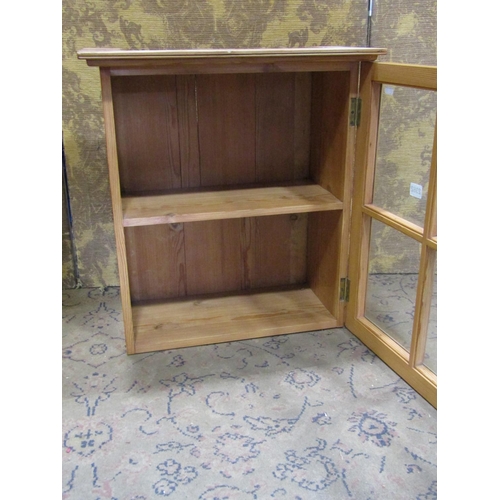 2362 - A stripped and waxed pine hanging cupboard with quarter pane astragal door, 56cm high x 51cm wide x ... 