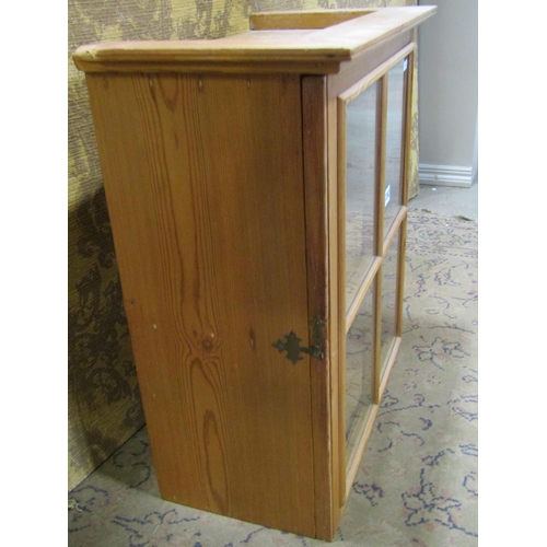 2362 - A stripped and waxed pine hanging cupboard with quarter pane astragal door, 56cm high x 51cm wide x ... 