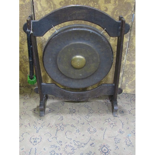 2375 - A bronze house gong, 48cm diameter, mounted in a Japanese oak pegged frame, complete with strike, 78... 