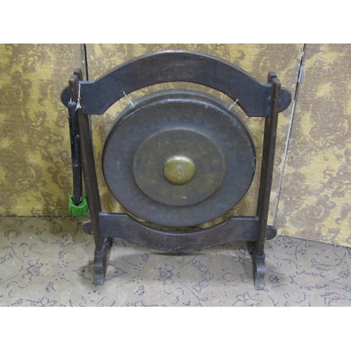 2375 - A bronze house gong, 48cm diameter, mounted in a Japanese oak pegged frame, complete with strike, 78... 