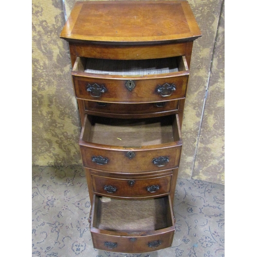 2378 - A good quality miniature walnut and figured walnut chest on chest enclosing six graduated drawers an... 