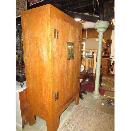 2387 - A good quality Japanese elm cupboard made from reclaimed timbers with heavily scrubbed finish, with ... 